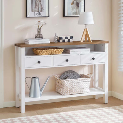 Console table with wooden top and white base, decorated with books, a basket, and a lamp.