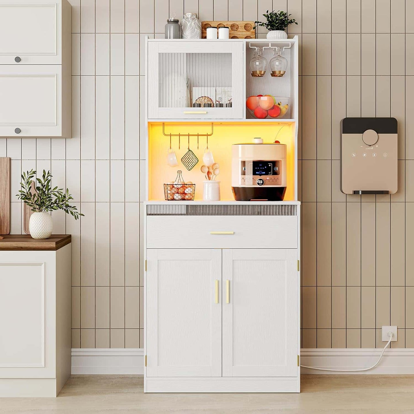 White kitchen cabinet with glass doors and a coffee maker inside, against a tiled wall.