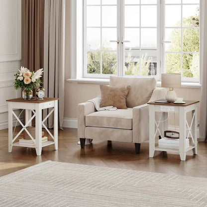 Living room with beige armchair and two white side tables with wooden tops.