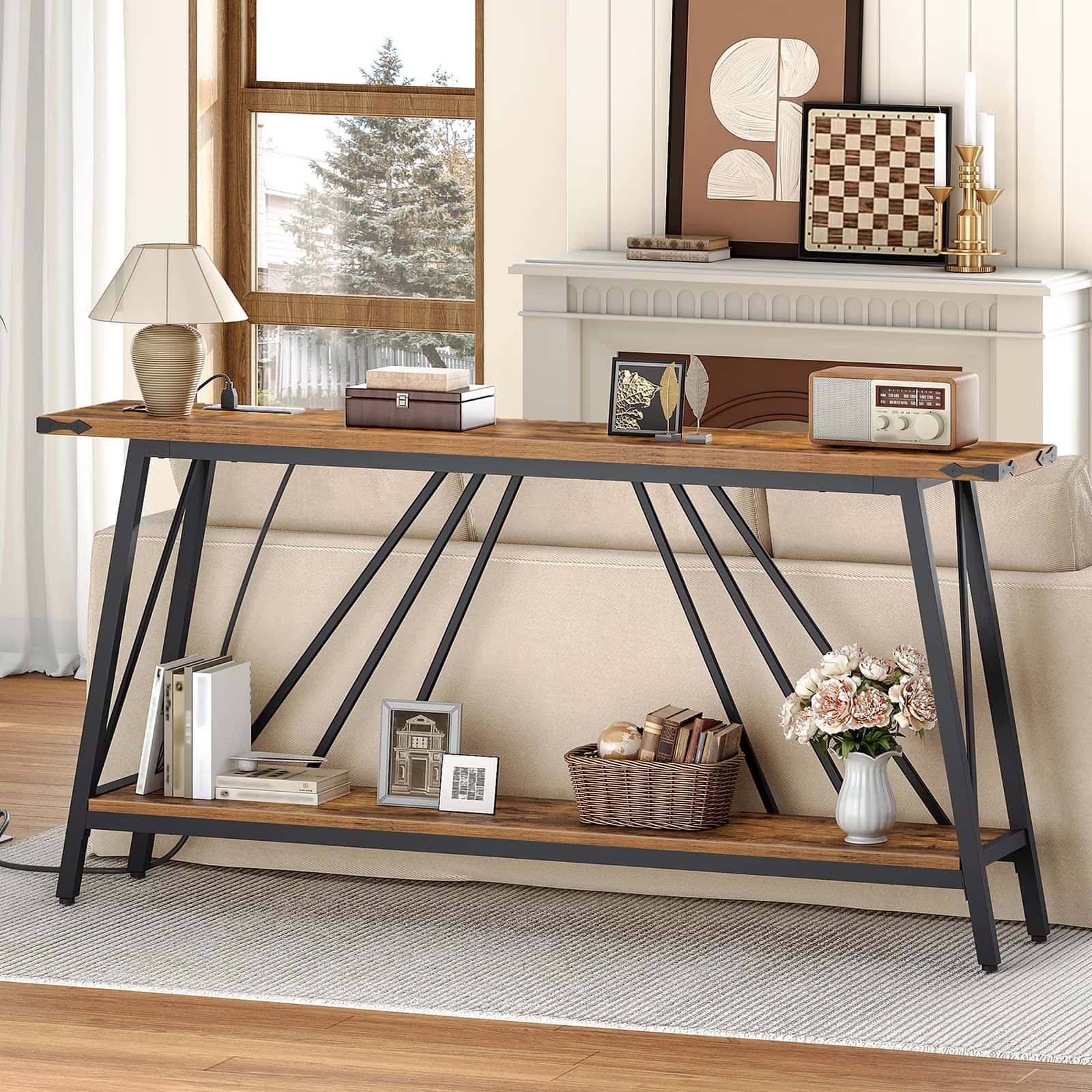 Wooden console table with black metal legs in a living room setting.