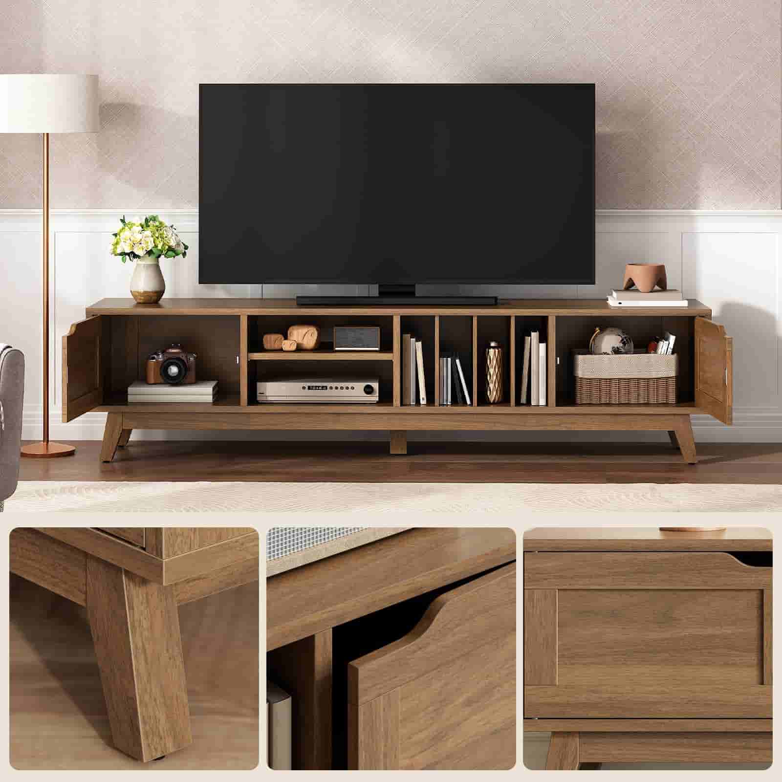 Wooden TV stand with a television mounted on it, featuring shelves and decorative items.