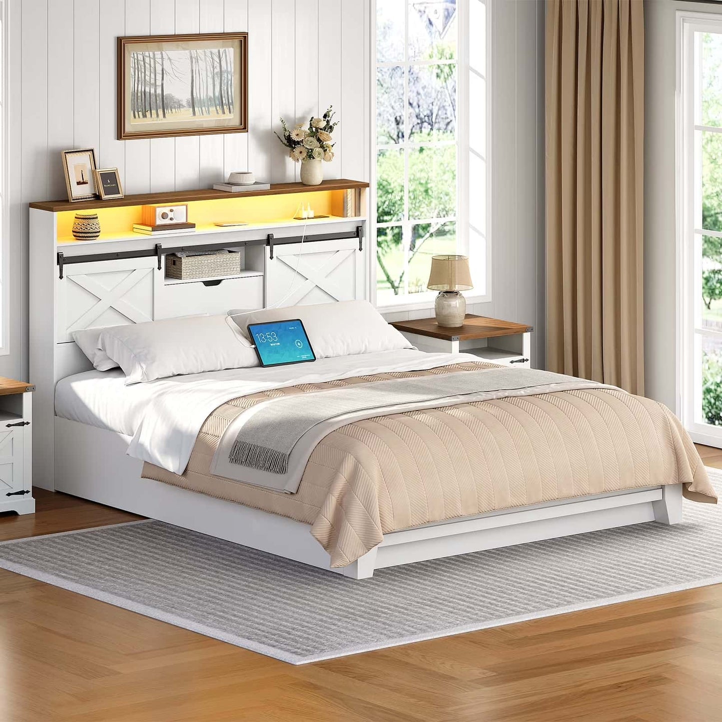Bedroom with a white bed, wooden headboard, and window view.