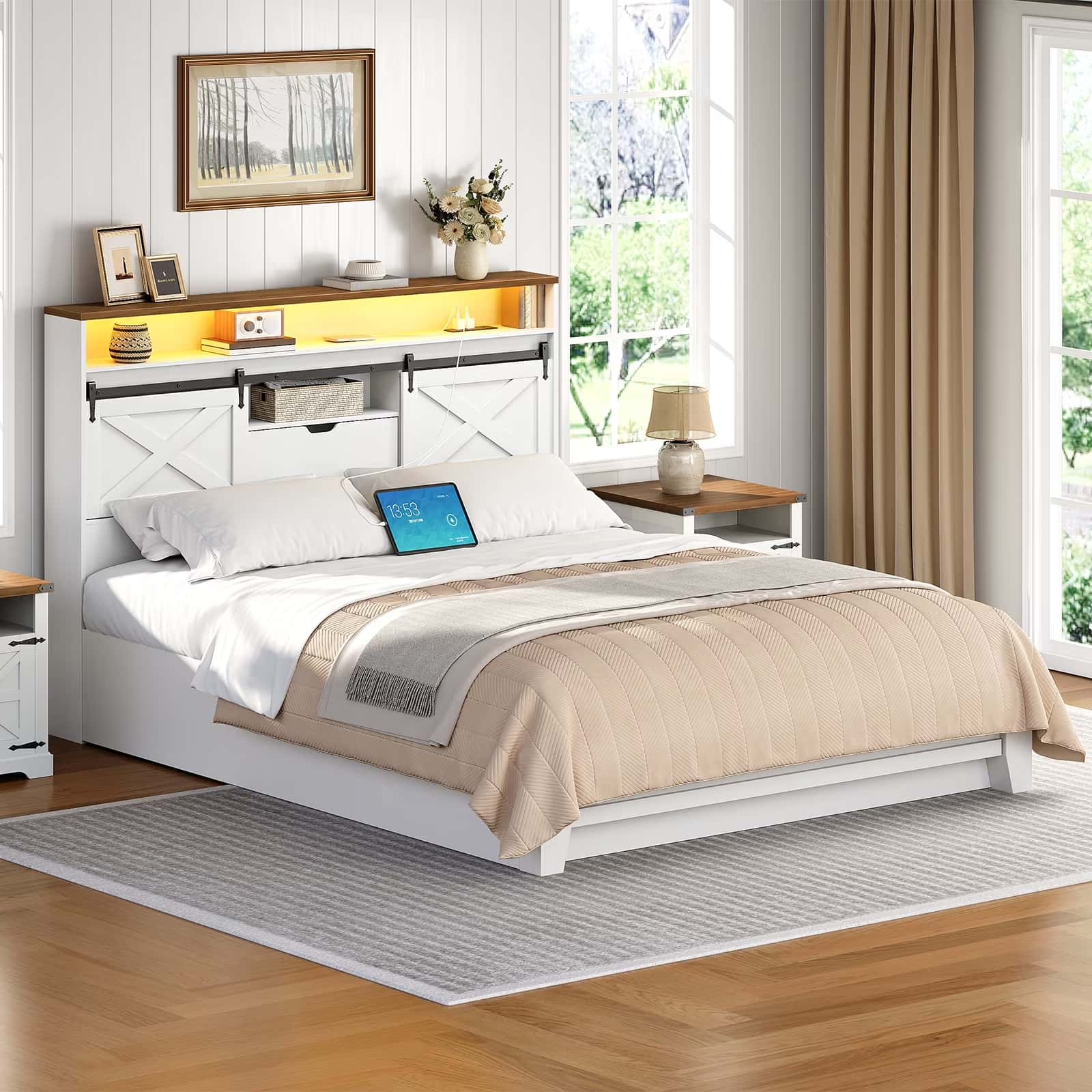 Bedroom with a white bed, wooden headboard, and window view.