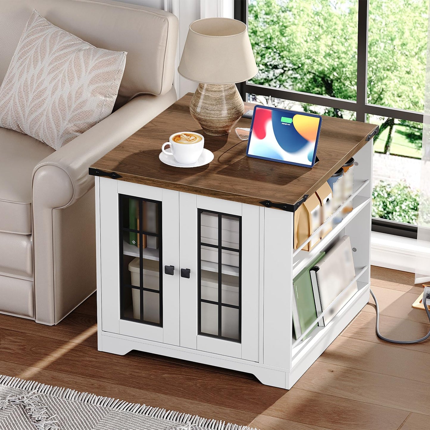 Wooden coffee table with a tablet, cup of coffee, and lamp in a living room setting.