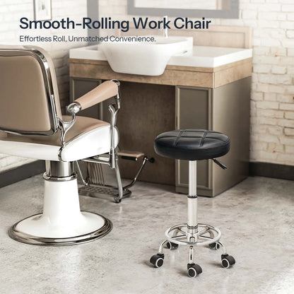 Smooth-rolling work chair and stool in a room with a desk and sink.