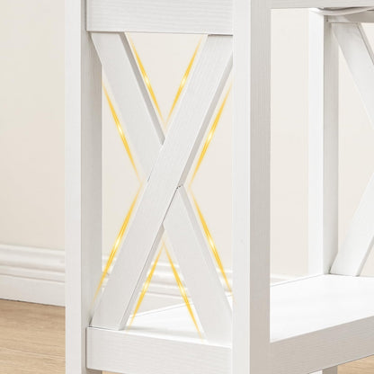 Close-up of a white wooden bed frame with a geometric design.
