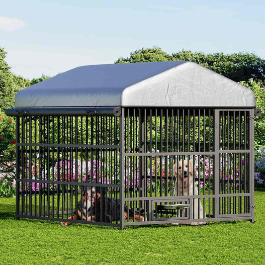 Large metal dog crate with two dogs inside, set against a green outdoor background with trees and flowers.