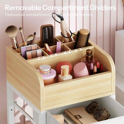 Wooden cosmetic organizer with removable compartment dividers filled with makeup and beauty products.