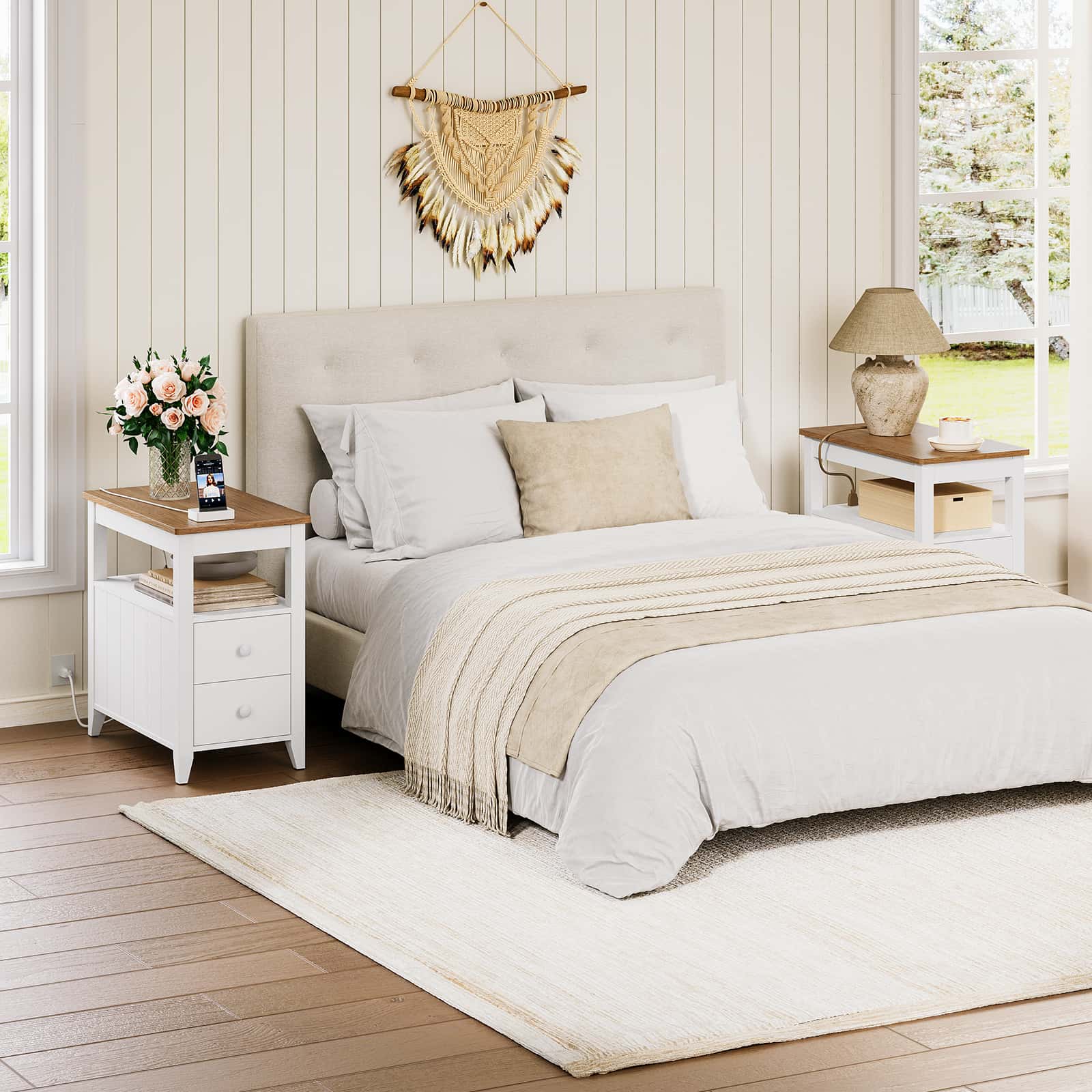 Neatly made bed in a bedroom with white walls and wooden flooring.