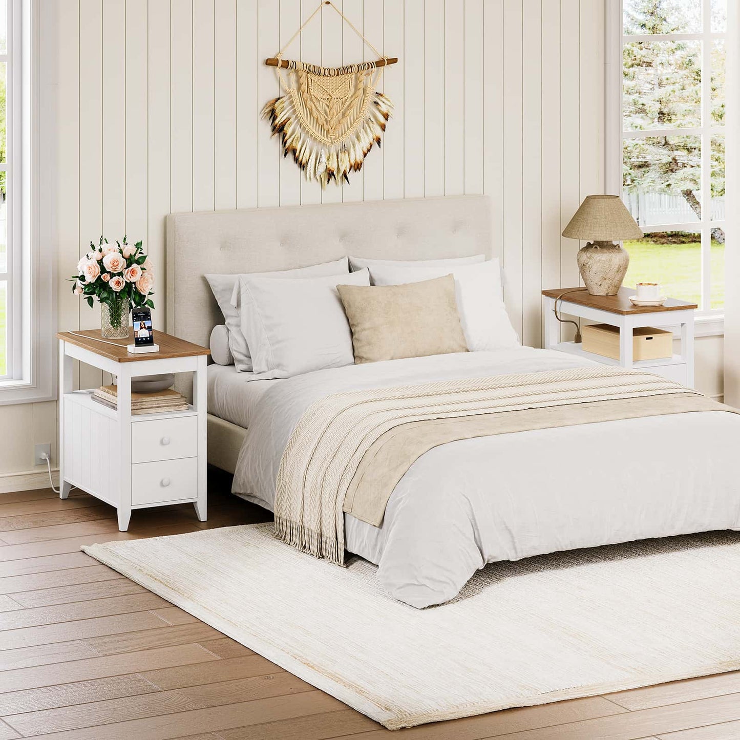 Neatly made bed in a bedroom with white walls and wooden flooring.