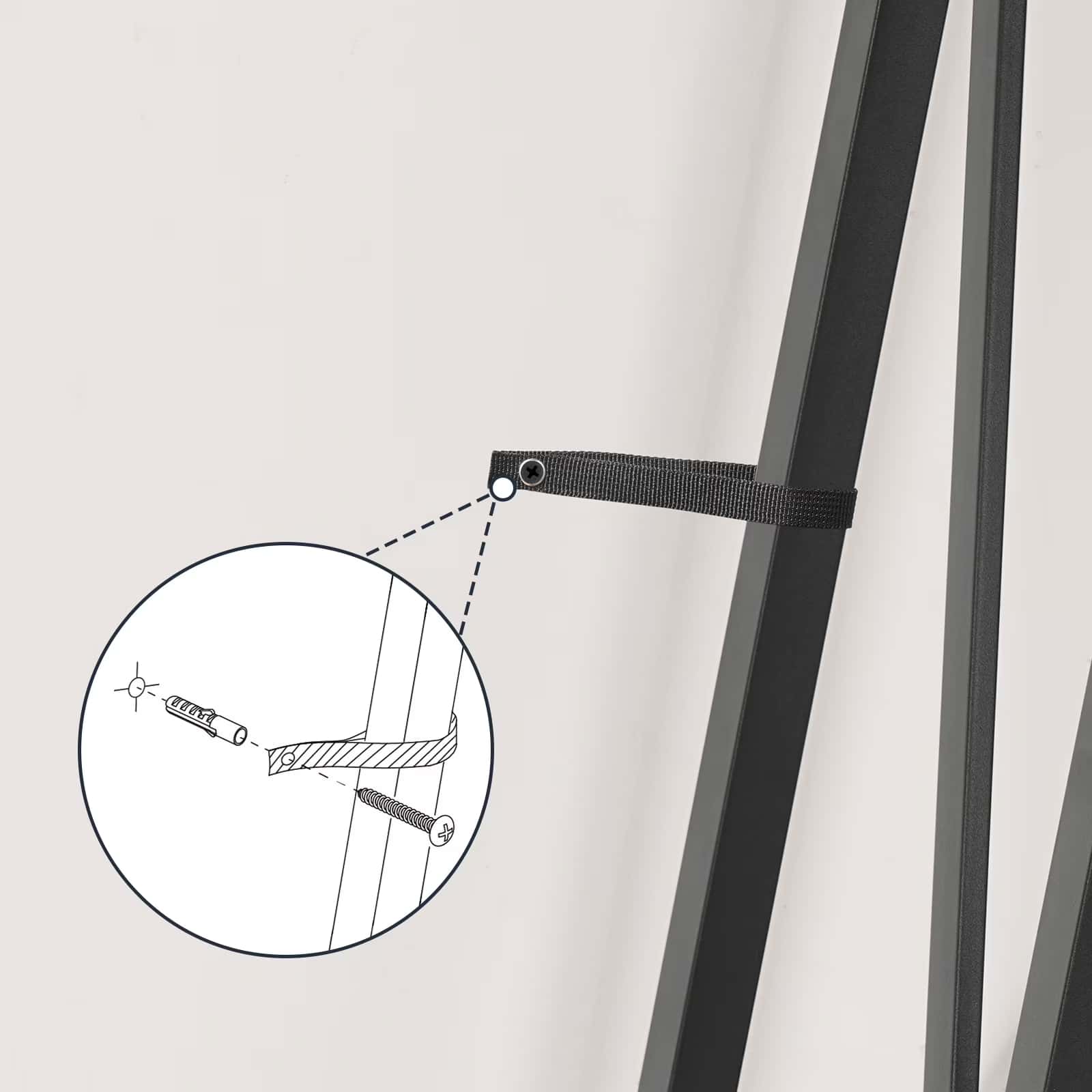 Black ribbon tied around a white curtain with a close-up detail of the knot on a light gray background.