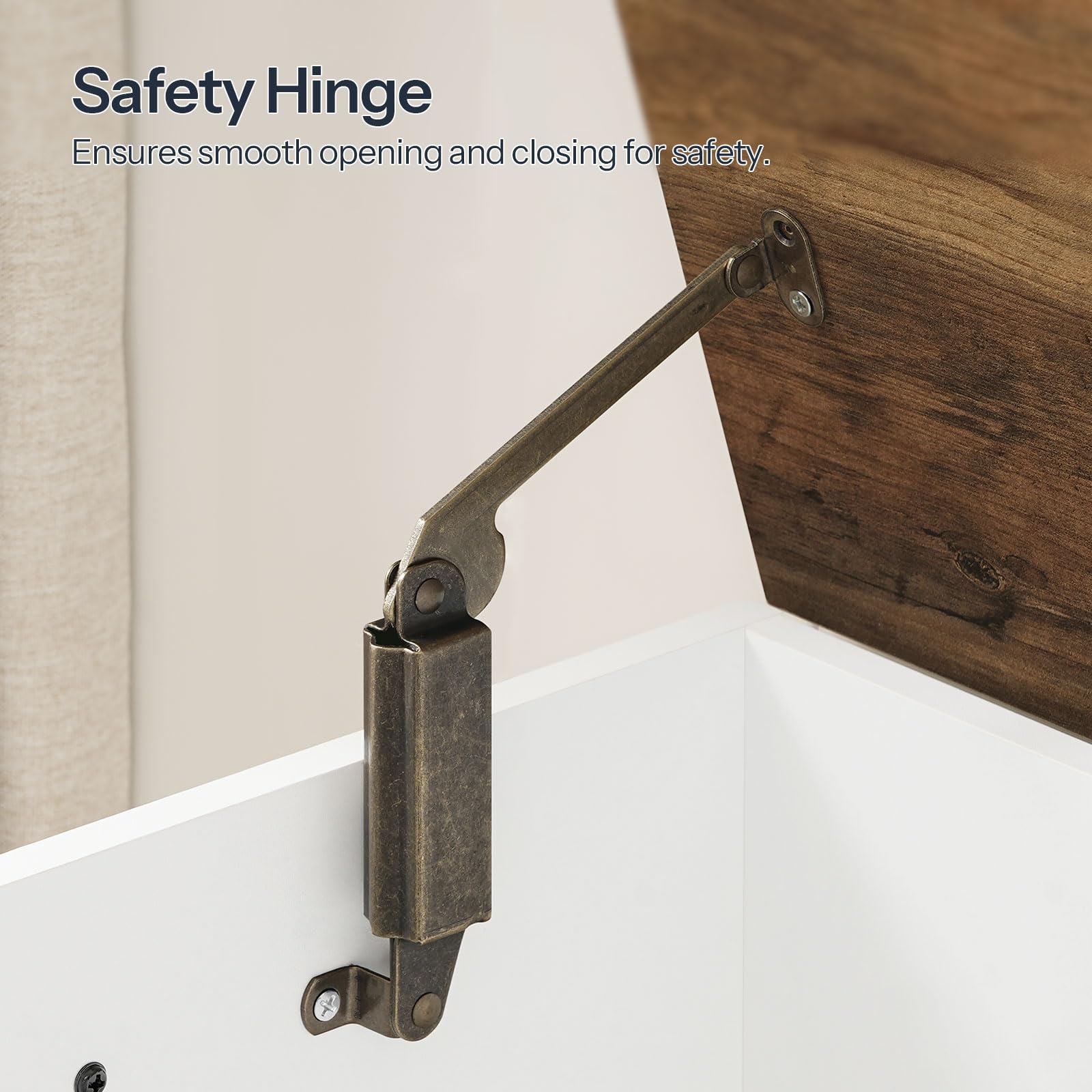Safety hinge on a wooden cabinet with text indicating its function.