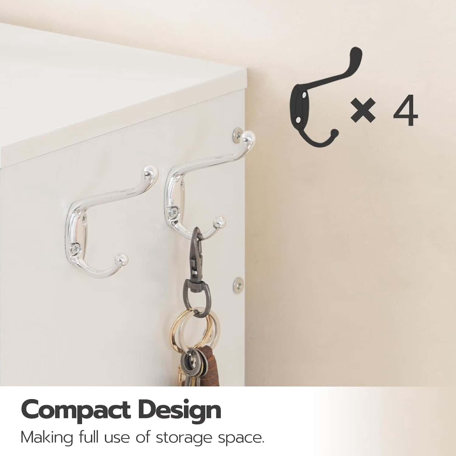 Set of four wall hooks on a white surface with keys hanging from one of them, labeled 'Compact Design'.