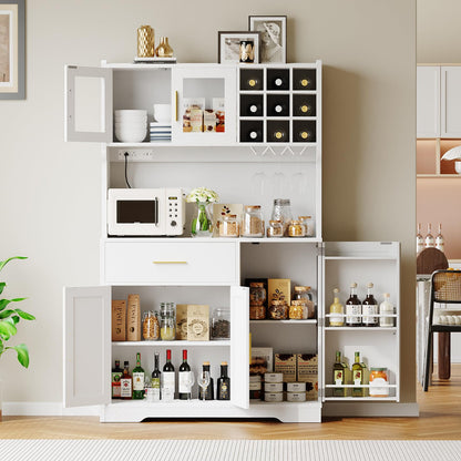 White kitchen cabinet with various items including bottles, a microwave, and decorative objects.