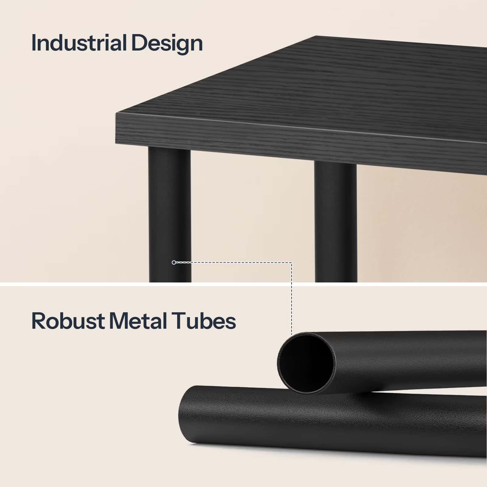 Black industrial-style table with robust metal tubes on a beige background