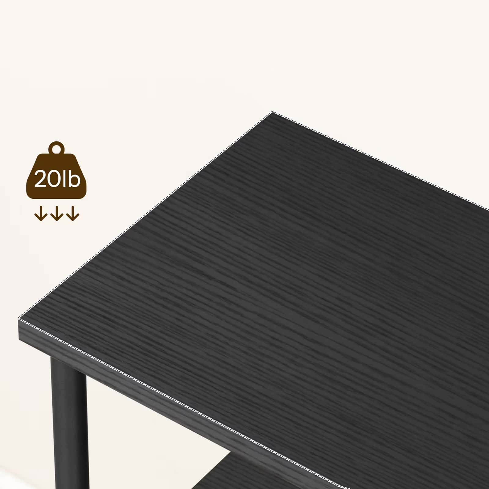 Black rectangular table with weight capacity indicator on a white background