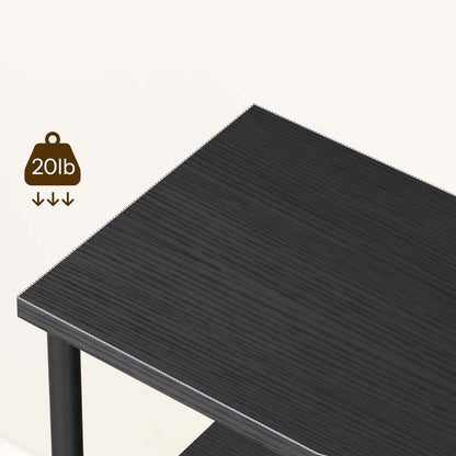Black rectangular table with weight capacity indicator on a white background