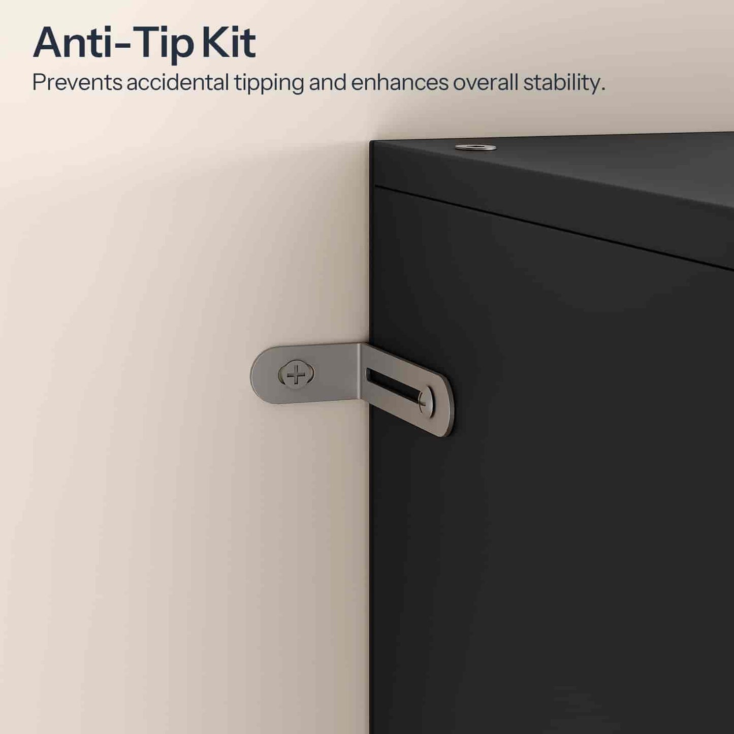 Anti-tip kit attached to a cabinet door with text explaining its function.