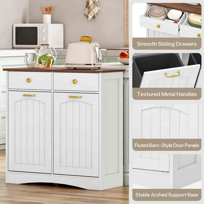 White kitchen cabinet with fluted barn-style door panels and textured metal handles, set against a kitchen background.