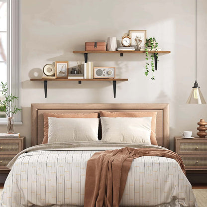 Neatly made bed with wooden headboard in a bedroom setting.