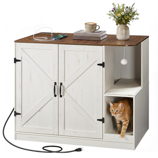 White cabinet with wooden top, cat peeking out from a shelf, and a cup and flowers on the top.