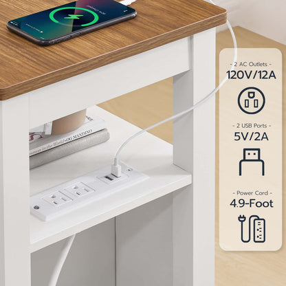 White power strip with multiple outlets and USB ports on a wooden surface, with a smartphone charging.