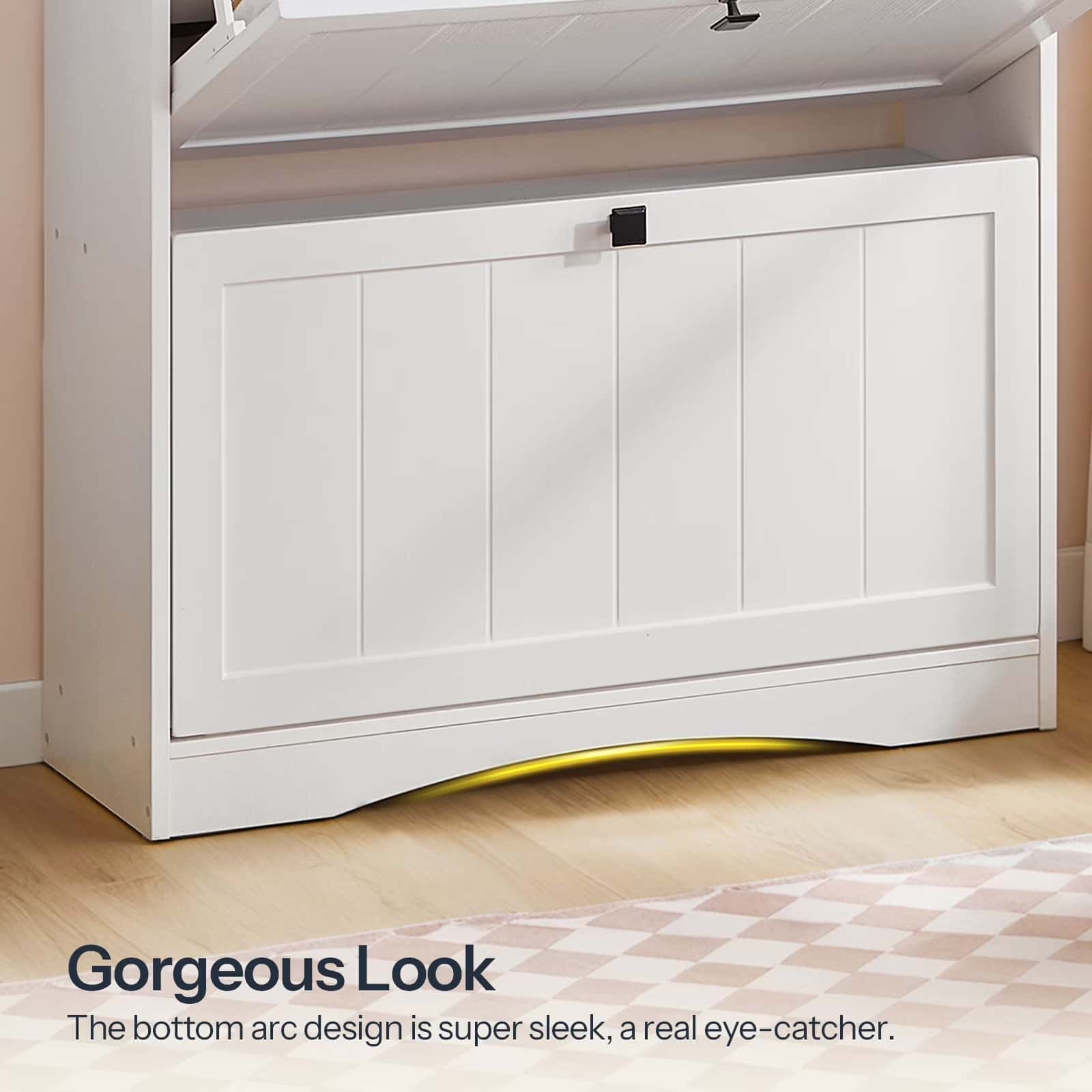 White cabinet with a sleek bottom arc design in a room setting.