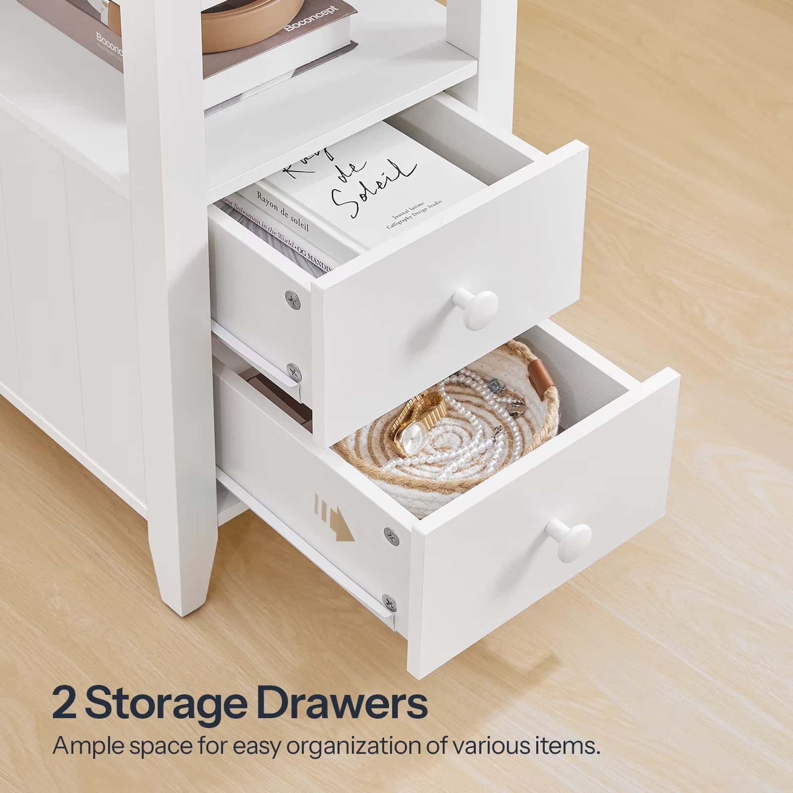 White storage unit with two open drawers on a wooden floor.