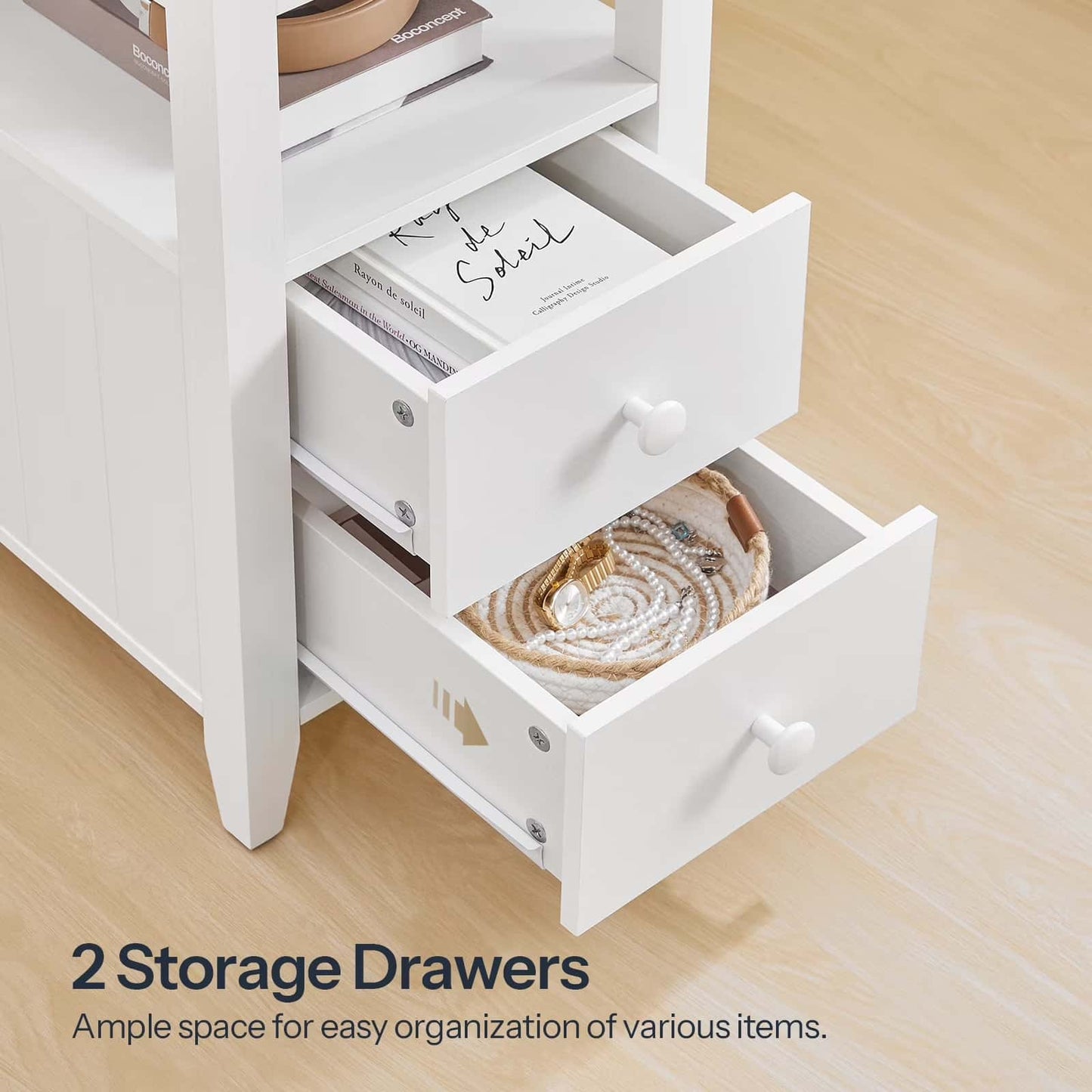 White storage unit with two open drawers on a wooden floor.
