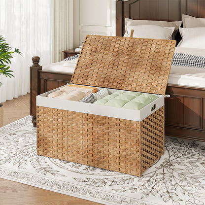 Woven storage basket with a lid on a patterned rug in a bedroom setting.