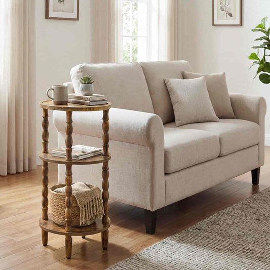 Beige sofa with a wooden side table in a living room setting