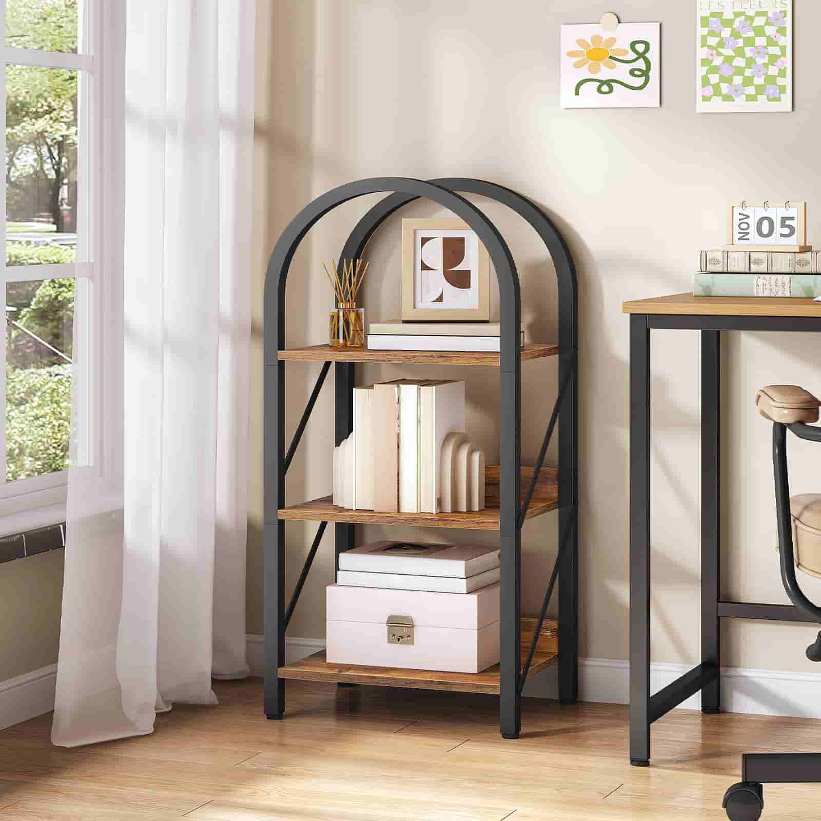 Bookshelf with decorative items in a room with a window and side table.