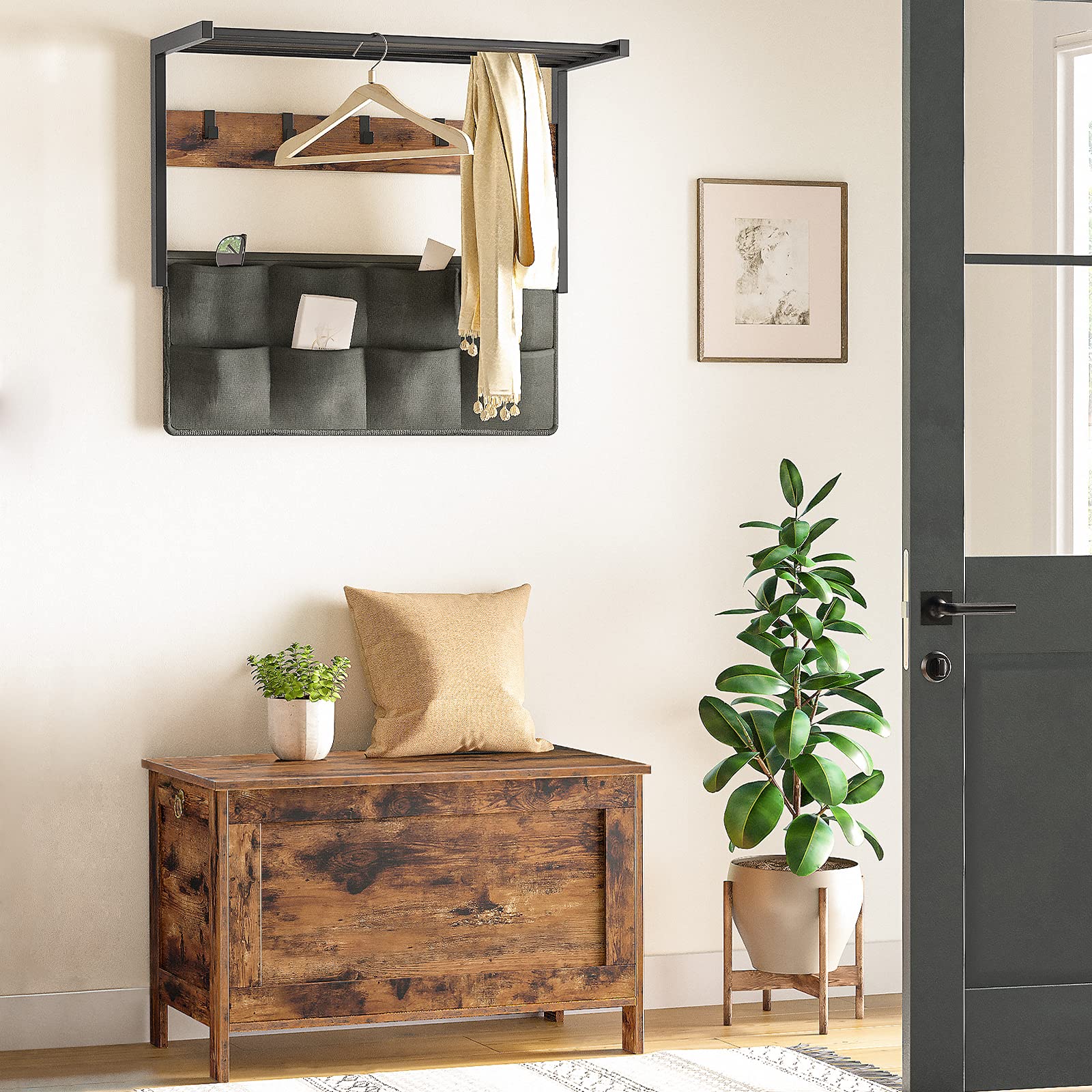 Room interior with wooden chest, mirror, and plants