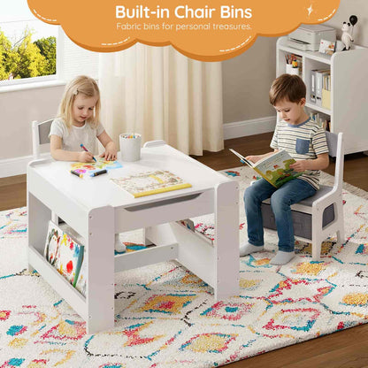 Children playing at a table with built-in chair bins in a room with a colorful rug.