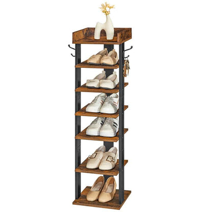 A 6-tier wooden shoe rack with a black metal frame and side hooks, shown holding various shoes and topped with a decorative ceramic deer figurine, on a solid white background.