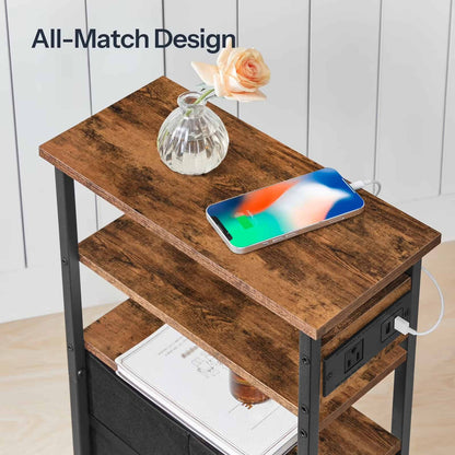 Close-up of the rustic brown wood grain top shelf of the narrow end table holding a flower vase and a phone.