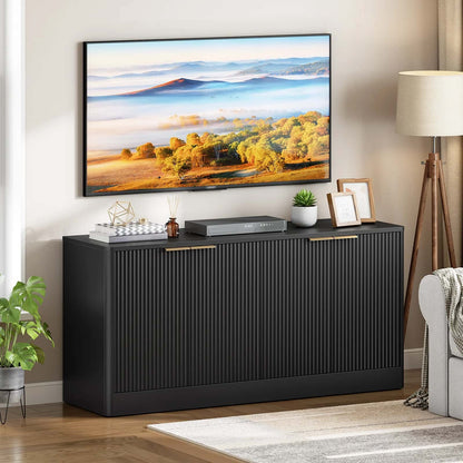 Modern living room with a black sideboard, TV displaying a scenic landscape, and decorative items.