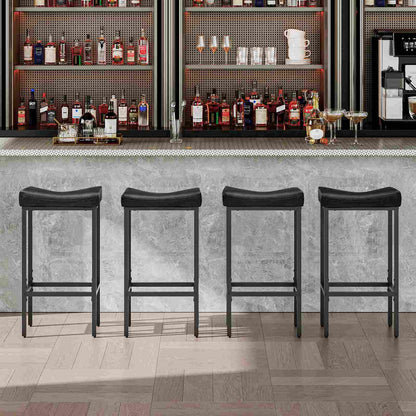 Front view of four black saddle bar stools placed neatly at a long commercial pub counter.