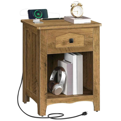 Wooden nightstand with charging station and electronic devices on a white background