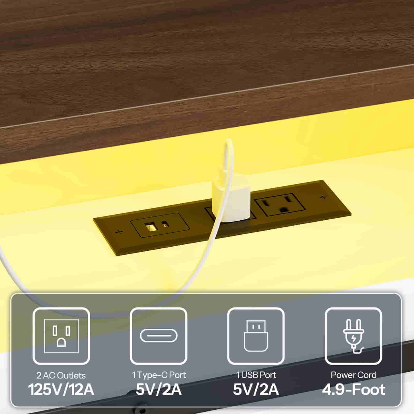 Close-up of the embedded power strip on the headboard shelf, featuring standard AC outlets and USB ports.