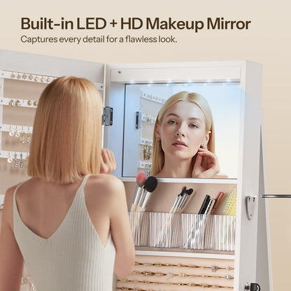 Woman using a makeup mirror with built-in LED and HD camera for precise application.