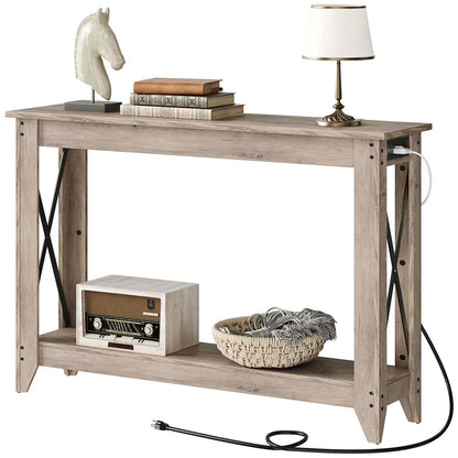 Wooden console table with decorative items on a white background