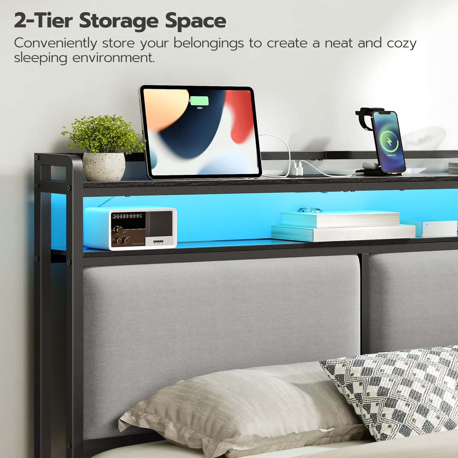 Bed with a 2-tier storage space above, featuring a tablet, phone, and small plant.