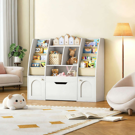 Childrens storage bookcase styled in a bedroom corner next to a small chair and lamp.