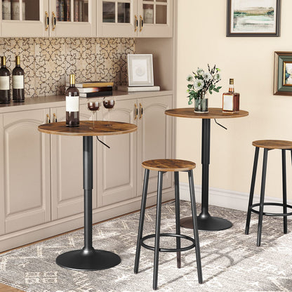 Two pieces of HOOBRO compact cafe bistro tables arranged in a modern restaurant dining lounge next to a bench.
