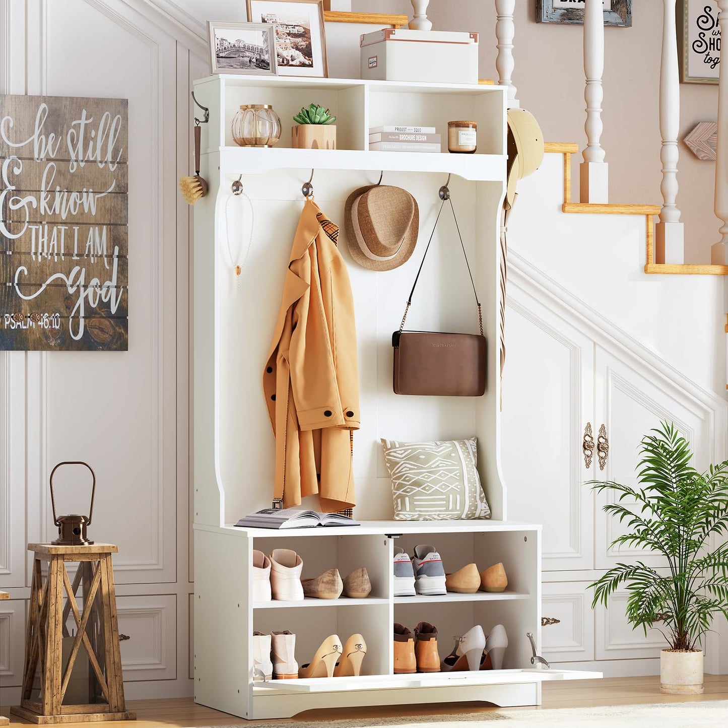 Compact mudroom coat rack tower with an open shoe drawer fitted perfectly next to a staircase corridor.
