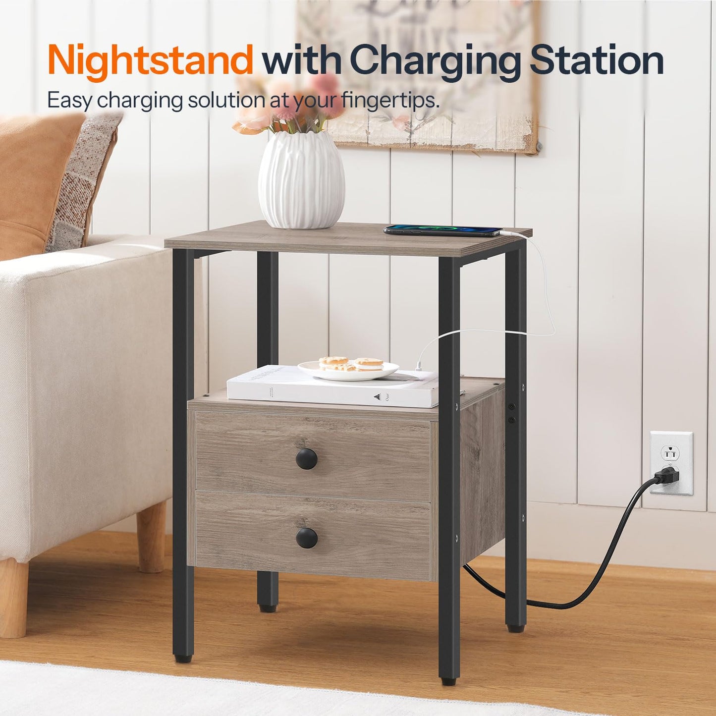 Couch side table with charging station powered by a long cord in a bright room