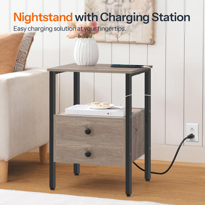 Couch side table with charging station powered by a long cord in a bright room