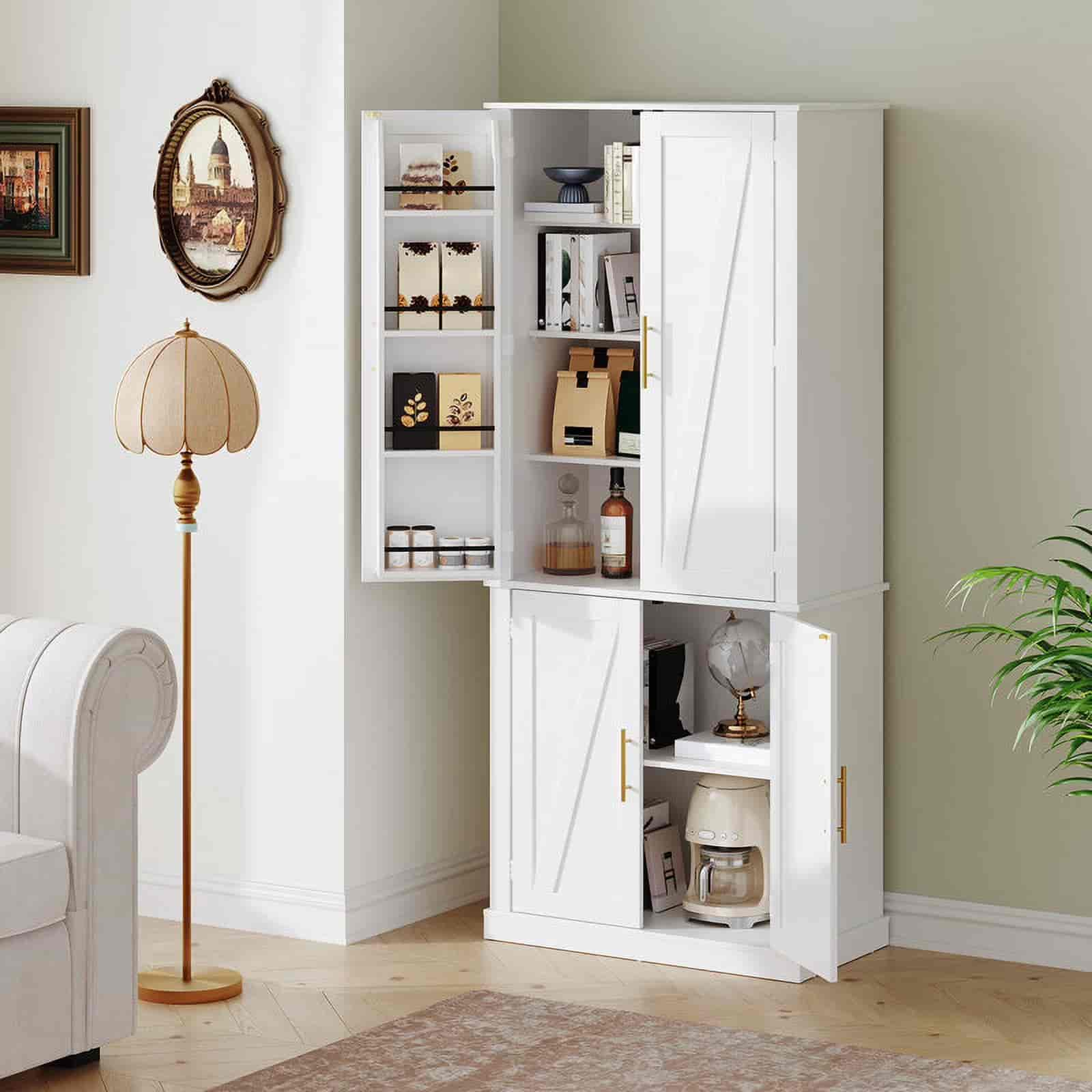 White storage cabinet with open doors in a room with a lamp and plant.