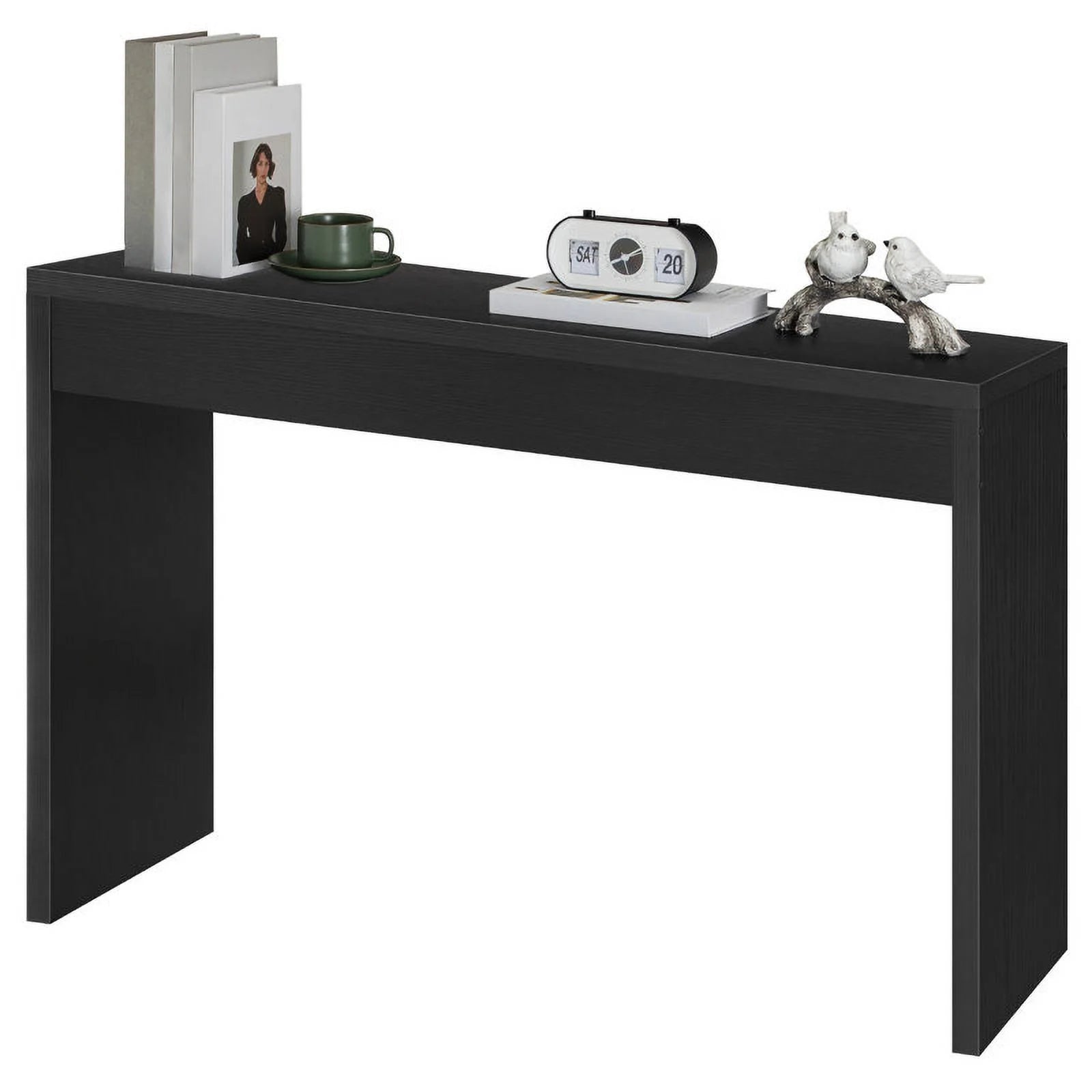 Black console table with decorative items on a white background